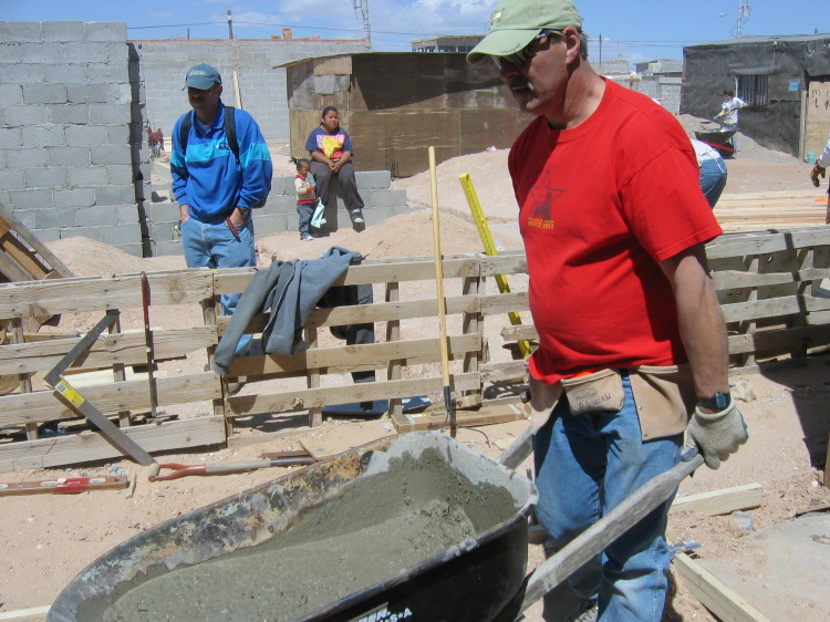 Image 27 of 168
dan delivers some concrete while balloon dan watches