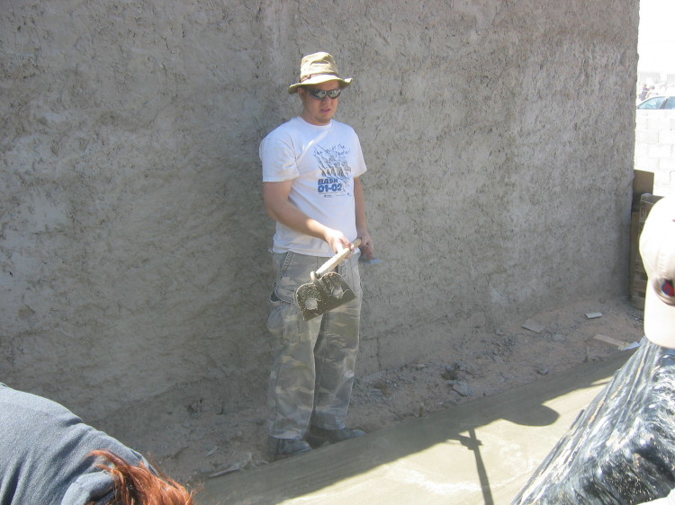 Image 29 of 168
jordan assists with placement of concrete