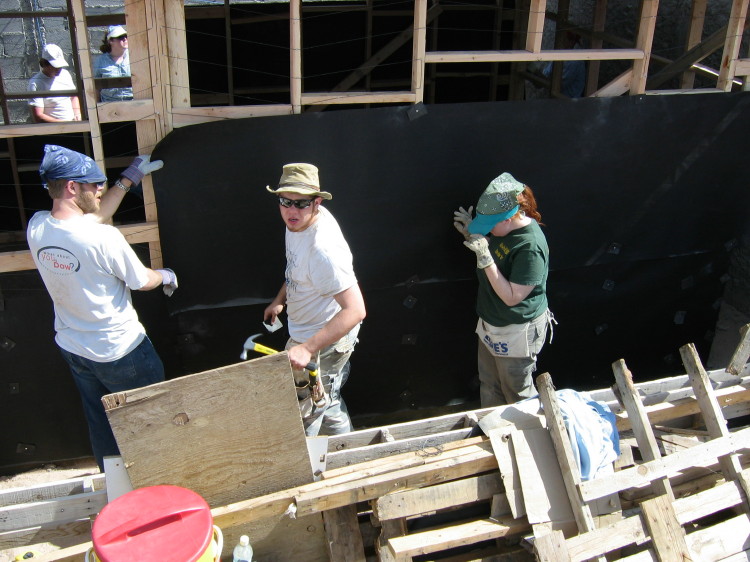 Image 94 of 168
joey, jordan, and jess hang tar paper