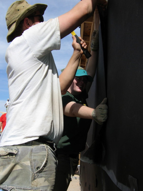 Image 97 of 168
jess and jordan hang tar paper