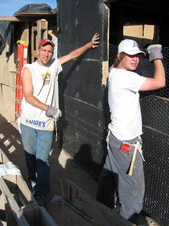 Image 102 of 168
freddie and travis perfect the art of hanging chicken wire