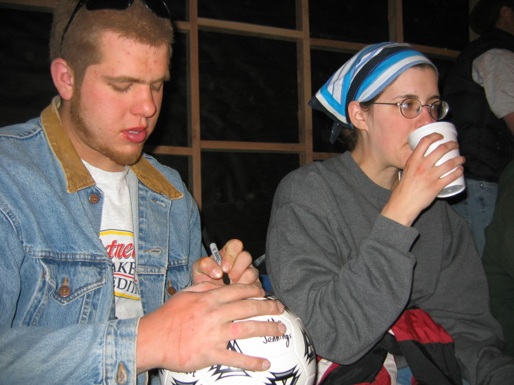 Image 150 of 168
signing the soccer ball
